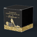 Gold High Heels Glitter Glam Birthday Party Favour Box<br><div class="desc">Elegant personalised square party favour box with gold glitter high heel stiletto shoes and a yellow gold faux glitter border with confetti sprinkles on a black background with custom thank you text, perfect for a modern and chic birthday, bat mitzvah, Quinceañera, bridal shower, baby shower or bachelorette party. USE THE...</div>