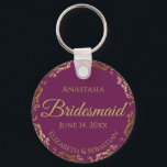 Gold Lace Bridesmaid Wedding Gift Cassis Purple Key Ring<br><div class="desc">These keychains are designed to give as favors to bridesmaids in your wedding party. They feature a simple yet elegant design with a cassis purple, magenta, or berry colored background, gold lettering, and a golden faux foil floral lace border. Perfect way to thank your bridesmaids for being a part of...</div>