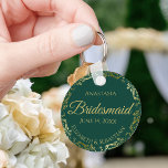 Gold Lace Bridesmaid Wedding Gift Emerald Green Key Ring<br><div class="desc">These keychains are designed to give as favors to bridesmaids in your wedding party. They feature a simple yet elegant design with an emerald green background,  gold lettering,  and a golden faux foil floral lace border. Perfect way to thank your bridesmaids for being a part of your special day!</div>