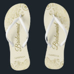 Gold Lace Elegant Ivory Cream Bridesmaid Wedding Flip Flops<br><div class="desc">These elegant wedding flip flops are a great way to thank and recognise your bridesmaids, while giving their feet a rest after a long day. The beautiful design features an elegant design with golden lace frills on an ivory or cream coloured background and fancy gold coloured script lettering. The text...</div>