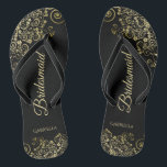 Gold Lace Frills Elegant Black Bridesmaid Wedding Flip Flops<br><div class="desc">These elegant wedding flip flops are a great way to thank and recognise your bridesmaids, while giving their feet a rest after a long day. The beautiful design features an elegant design with golden lace frills on a classic black background and fancy gold coloured script lettering. The text reads Bridesmaid...</div>