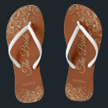 Gold Lace on Rust Orange Elegant The Bride Wedding Flip Flops<br><div class="desc">Dance the night away with these beautiful wedding flip flops. Designed for the bride, they feature a simple yet elegant design with gold coloured script lettering on a rust orange or burnt umber coloured background and fancy golden lace curls and swirls. Beautiful way to stay fancy and appropriate while giving...</div>