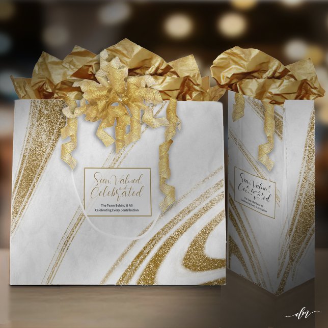 Gold Marble Event Gift Bags (Elegant gift bags styled with tissue and ribbon for a premium presentation.)