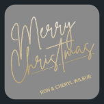 Gold Merry Christmas Luxe Grey Square Sticker<br><div class="desc">Merry Christmas in a faux gold foil script and your names in chic lettering,  these grey stickers are stylish for any Christmas holiday occasion. MORE COLORS and matching products in our collection.</div>