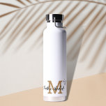 Gold Minimal Modern Initial Monogram Name Water Bottle<br><div class="desc">Are you looking for a cool personalised waterbottle? Check out this Beige Minimal Modern Initial Monogram Name Water Bottle . You can personalise it very easily with your own name and monogram. And as a bonus,  there are some added doodle stars. Happy customising!</div>