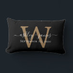 Gold Monogram Wedding Date Black Lumbar Pillow<br><div class="desc">Elegant wedding keepsake pillow features your names in white chic handwritten script calligraphy and your stylish gold monogram on a black background. Simply add your names, monogram and wedding date. Great gift for a newlywed couple. Exclusively designed for you by Happy Dolphin Studio. If you need any help or matching...</div>