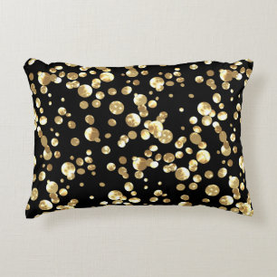 Gold polka dots on a black background . decorative cushion