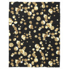 Gold polka dots on a black background .