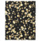 Gold polka dots on a black background .