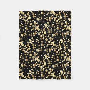 Gold polka dots on a black background . fleece blanket