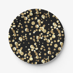 Gold polka dots on a black background . paper plat paper plate