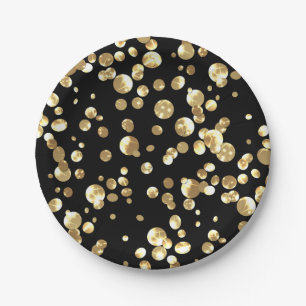 Gold polka dots on a black background . paper plate