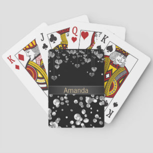 Gold polka dots on a black background . playing ca playing cards