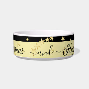 Gold shiny Christmas stars, paws on gold & black Bowl