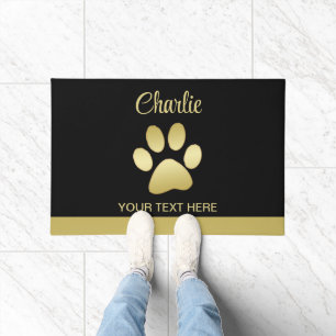 Gold Shiny Dog Paw on black background Doormat