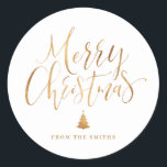 Gold Simple Calligraphy Merry Christmas Classic Round Sticker<br><div class="desc">Personalised Christmas gift stickers feature big faux gold foil handwritten calligraphy and Christmas tree,   simple,  modern and elegant.</div>