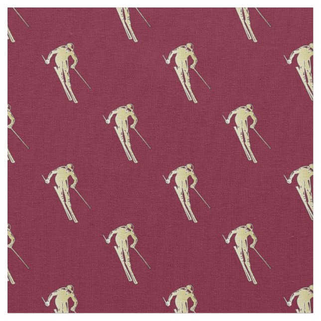 Gold skier on red fabric (Close Up)