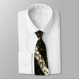 Gold sparkly line on black rock tie