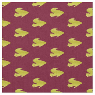 Gold squirrel on red fabric