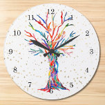 Gold Stars Rainbow Colours Tree of Life Large Clock<br><div class="desc">This whimsical clock is decorated with a print of a Tree Of Life design in rainbow colours and gold stars.
The tree was originally made in mosaic using tiny fragments of brightly coloured glass.
Original Mosaic © Michele Davies.</div>