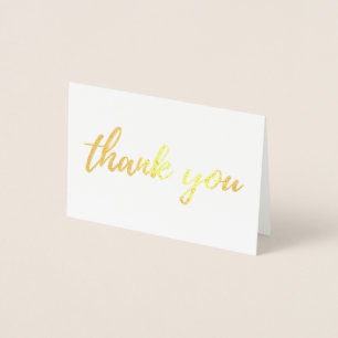 Gold thank you card folded. Modern wedding foil