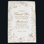 Gold Toile De Jouy Bridal Shower Favours Medium Gift Bag<br><div class="desc">Elevate your celebrations with our gold Toile party decor, featuring detailed floral french country toile on a warm white background. This regency-inspired Chinoiserie design exudes elegance and sophistication. ★ Let me help you plan your next party! ★ If you need coordinating décor, please check my matching collection. If you have...</div>