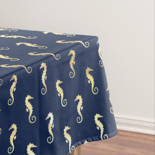 Gold Tone Seahorses over Navy Blue Tablecloth