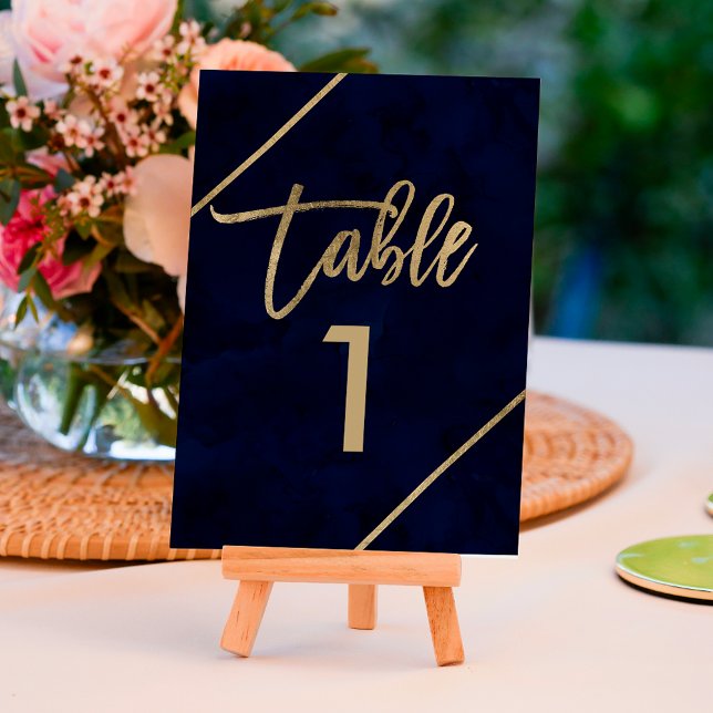 Gold typography navy blue watercolor table number (Creator Uploaded)