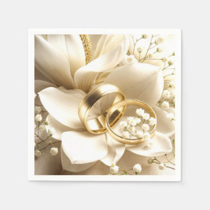 Gold Wedding Bands On a Magnolia Flower Napkin