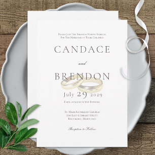 Gold Wedding Rings on White Wedding Invitation