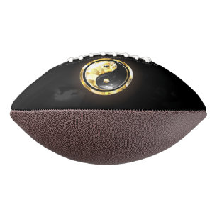Gold Yin Yang on black American Football
