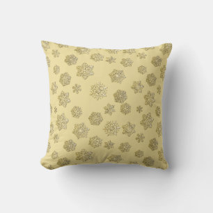 Golden 3-d snowflakes on a gold background cushion