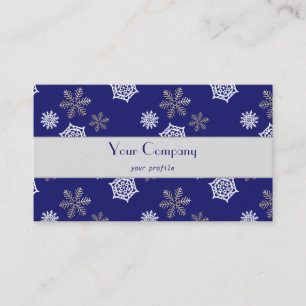 golden and white snowflakes against midnight blue business card