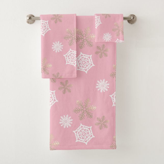 golden and white snowflakes against pale pink bath towel set (Insitu)
