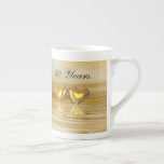 Golden Anniversary Hearts Bone China Mug<br><div class="desc">A mug with my simple design of two golden hearts floating on water. Customisable text says "50 Years".</div>