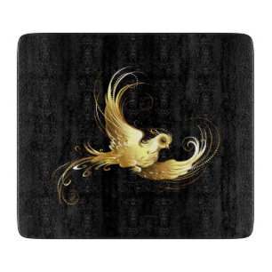Golden Bird on Black Background Cutting Board