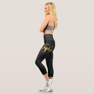Golden Bird Skull on Black background Capri Leggings