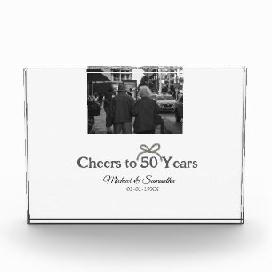 Golden bow cheers to 50 years anniversary wedding photo block