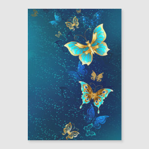 Golden Butterflies on a Blue Background