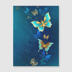 Golden Butterflies on a Blue Background
