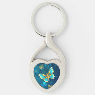 Golden Butterflies on a Blue Background Key Ring