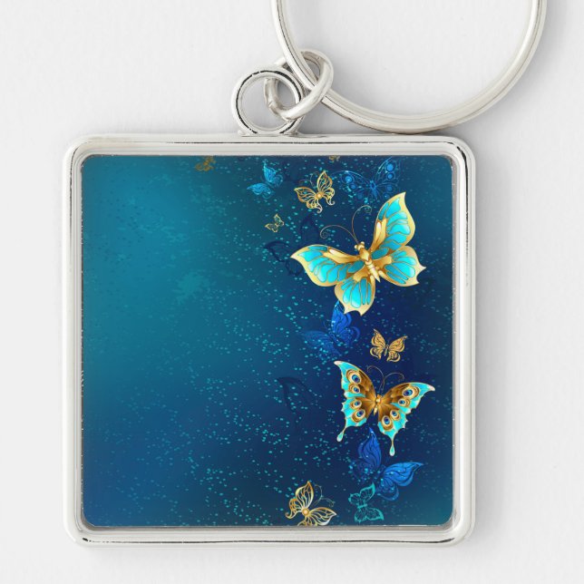 Golden Butterflies on a Blue Background Key Ring (Front)