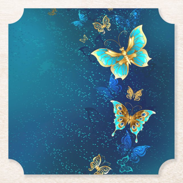 Golden Butterflies on a Blue Background Paper Coaster (Front)