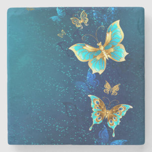 Golden Butterflies on a Blue Background Stone Coaster