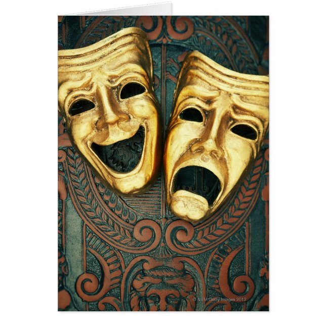 Golden comedy and tragedy masks on patterned (Front)