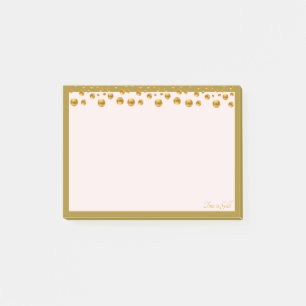Golden confetti and golden frame on ivory post-it notes