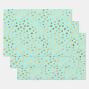 Golden dots on mint background wrapping paper sheet