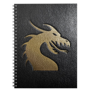 Golden dragon silhouette on black leather notebook