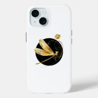 Golden dragonfly in black circle