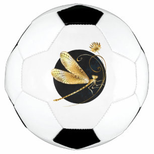 Golden dragonfly in black circle football